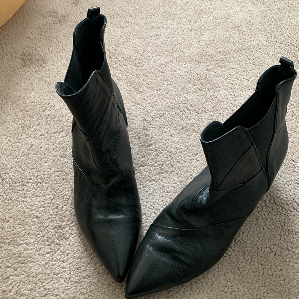 Beautiful slip on black leather booties made by Napoleon in Italy.
